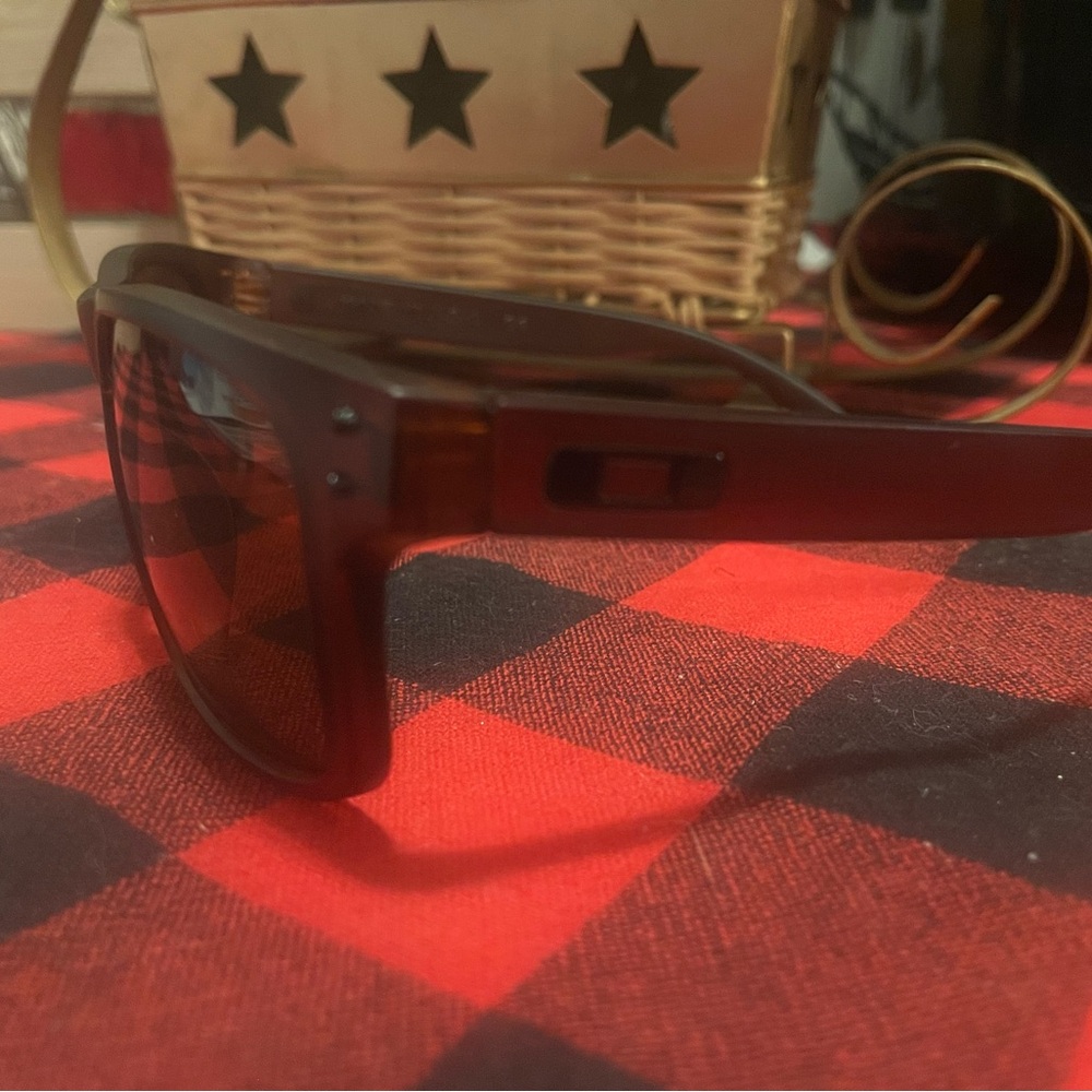 Gently used matte brown sunglasses. These feature the popular "Holbrook" silhoue